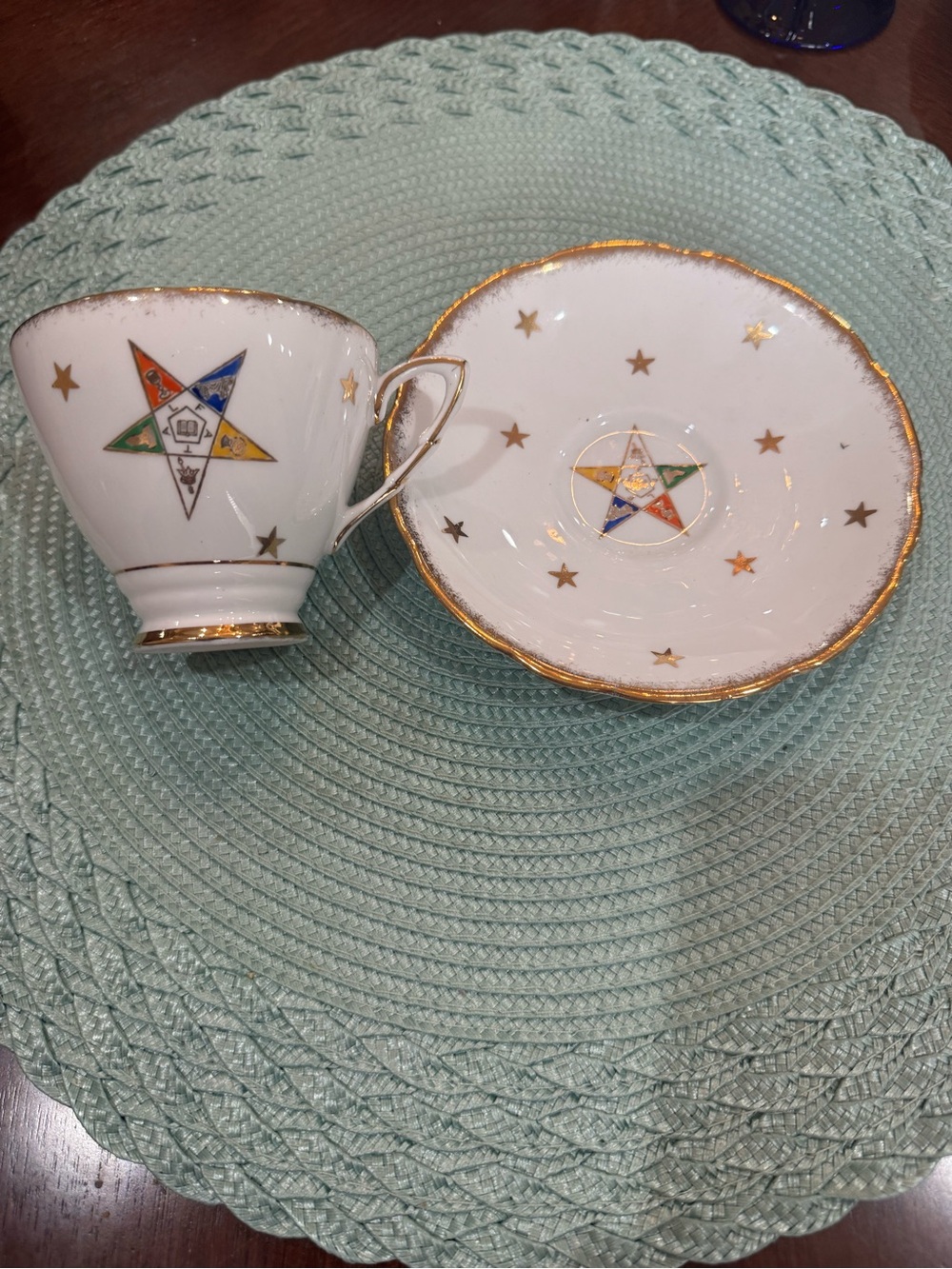 Porcelain Teacup and Saucer Set with Multicolor Star and Gold Trim